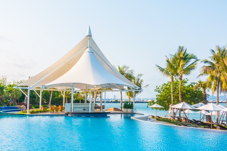 Free Photo umbrella and chair around swimming pool