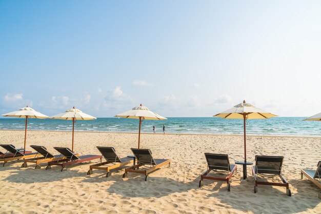 Umbrella and chair on the beach and sea