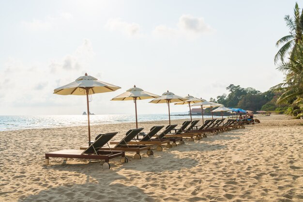 Umbrella and chair on the beach and sea