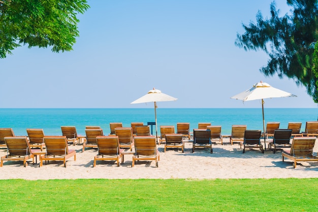 Umbrella pool and chair on the beach