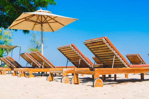 Umbrella pool and chair on the beach