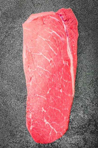 uncooked meat eye steak red