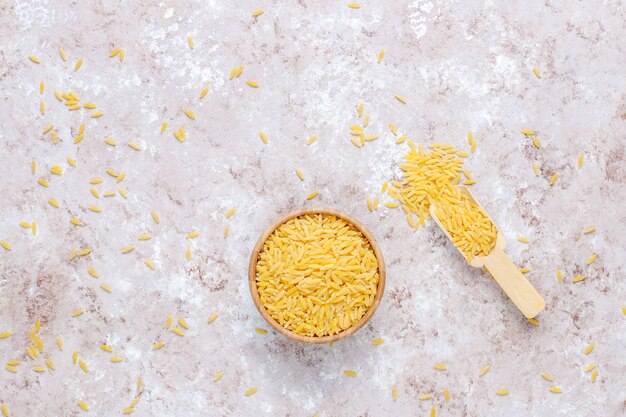 Uncooked risotto in bowl,top view