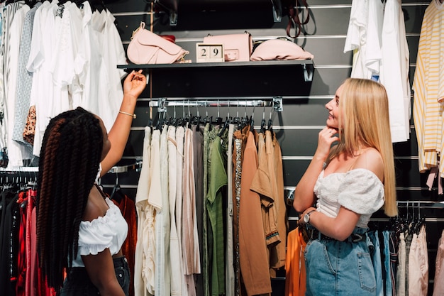 Undecided women at shopping