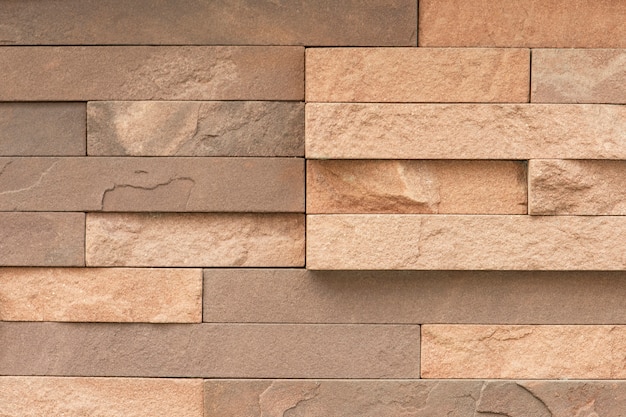 Free photo uneven sandstone tile for wall surface