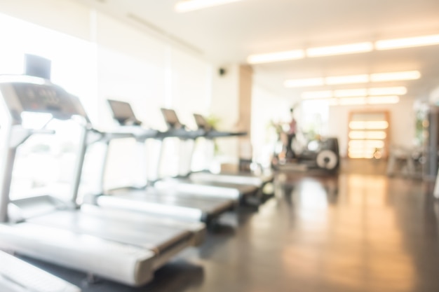 Free photo unfocused background of treadmills