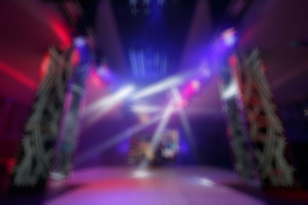 Unfocused entry disco colors with spotlights