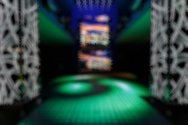 Unfocused entry disco with green predominating