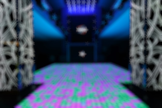 Free photo unfocused entry disco with purple and green squares