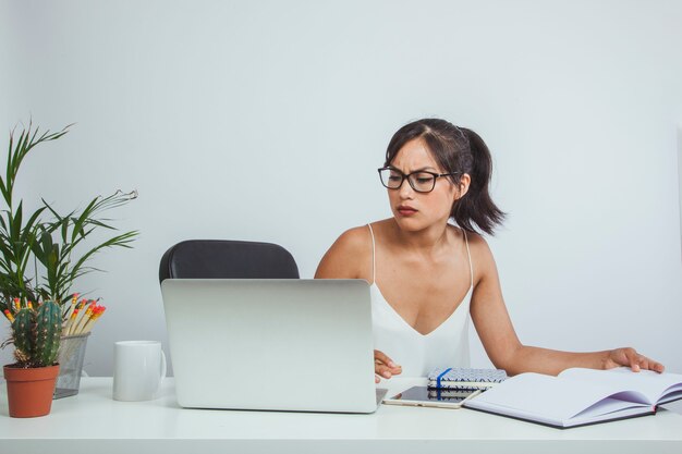 Unhappy woman at work