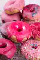 Free photo unhealthy sweet donuts close up