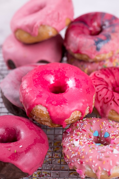 Unhealthy sweet donuts close up