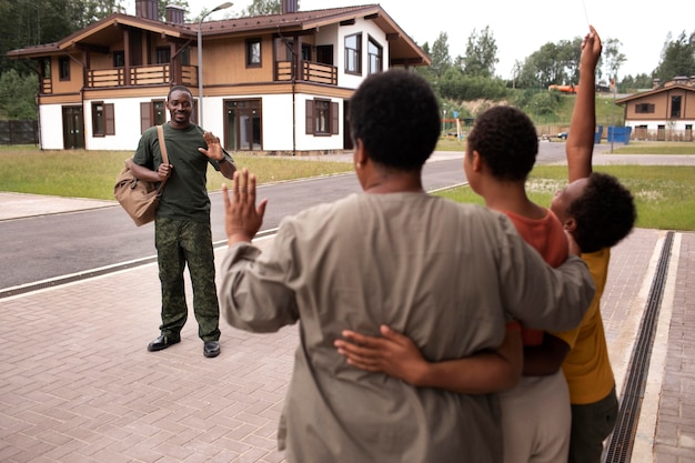 United states soldier departing from his family