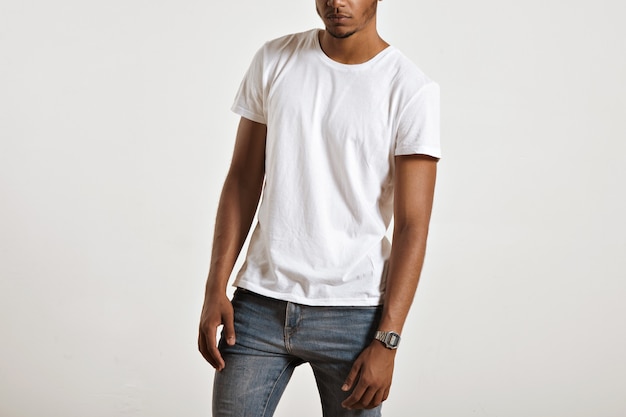 Unlabeled white cotton t-shirt presented on muscular body of a young athlete