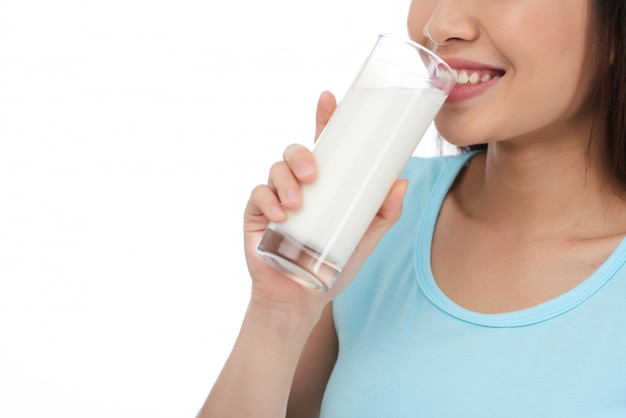 Unrecognizable Woman Enjoying Milk