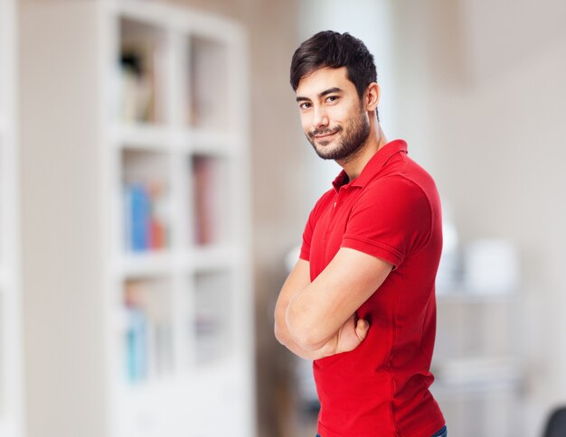 Unshaven teen wearing red t-shirt