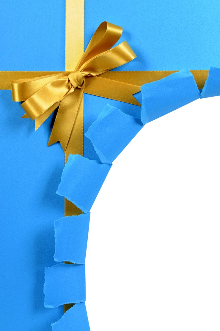 Free Photo untidy torn blue and gold gift 
