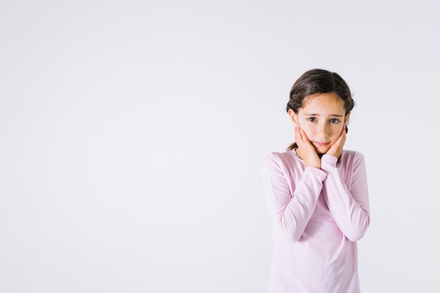 Upset girl looking at camera