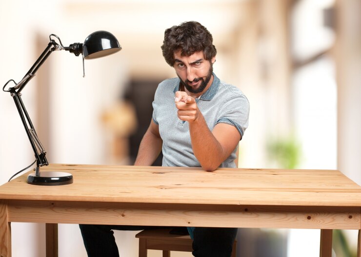 Free Photo upset guy pointing at you