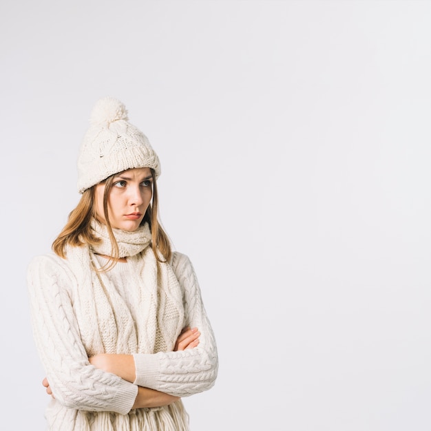 Upset woman in warm clothes