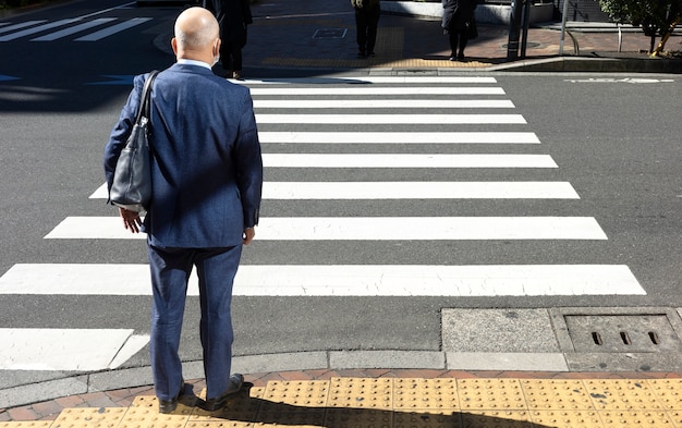 Urban landscape of tokyo city with pedestrian crossing