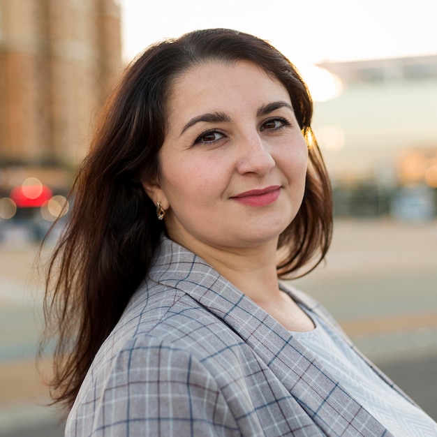 Urban portrait of brunette woman