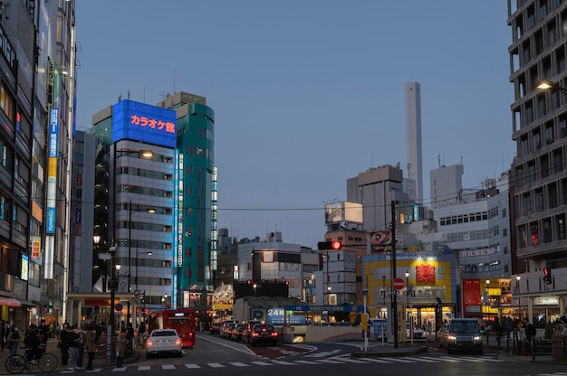 Urban view with cars and people