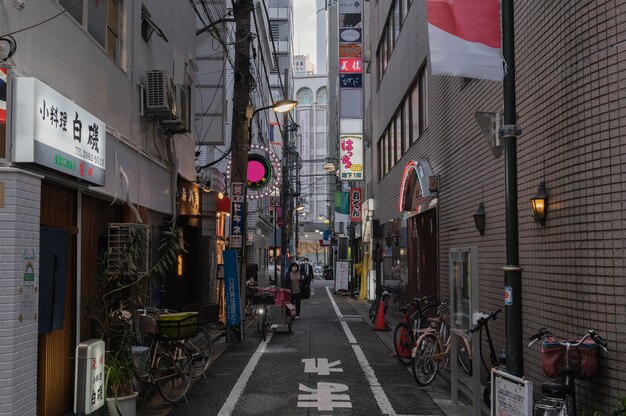 Urban view with people on narrow street