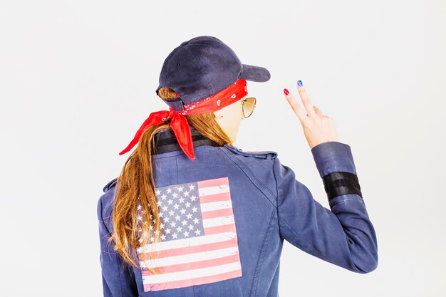 Urban woman with american flag on jacket