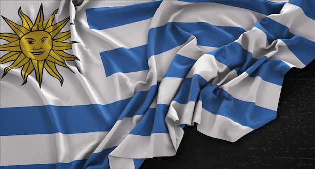 Free photo uruguay flag wrinkled on dark background 3d render