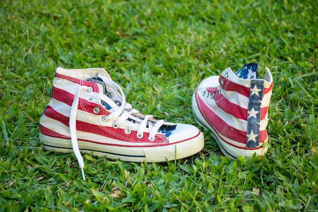 Usa flag sneakers on grass