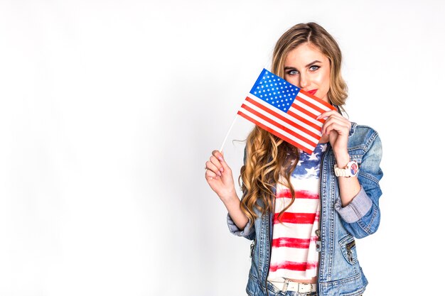 Usa independence day concept with woman showing flag