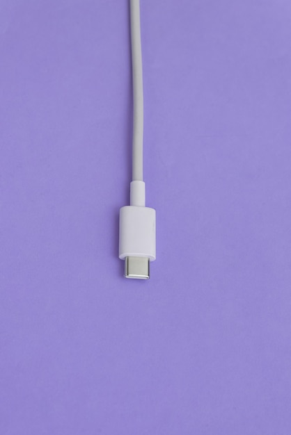 USB cable type C over blue background