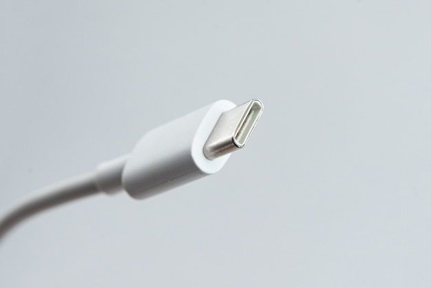 USB cable type C over white isolated background