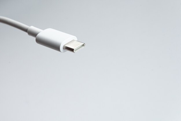 USB cable type C over white isolated background