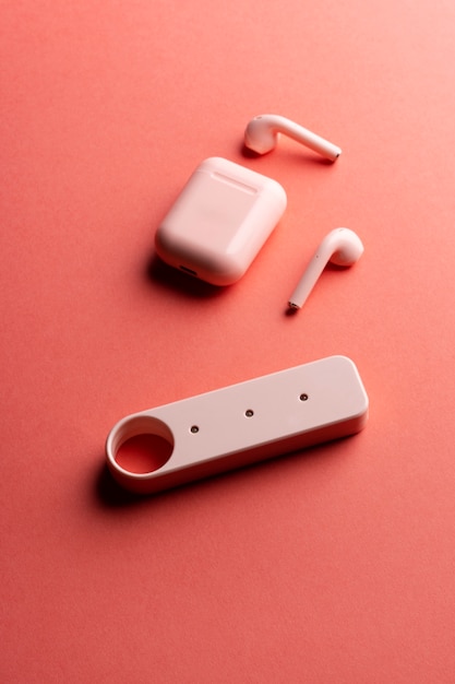 Usb flash drive tech device with minimalist monochrome background and earphones