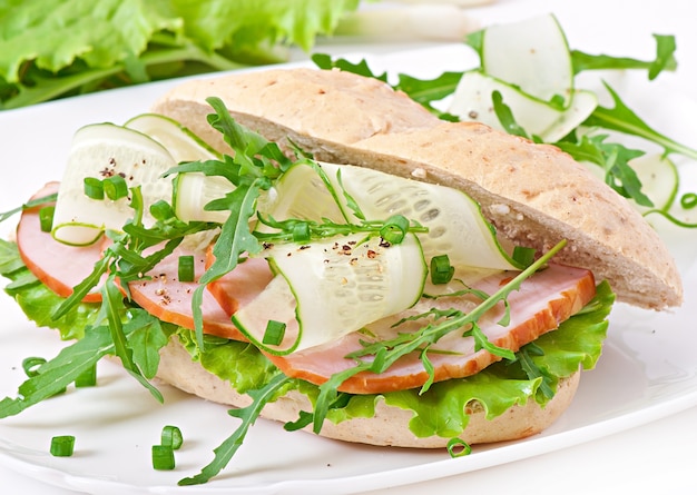 Useful sandwich with ham and herbs