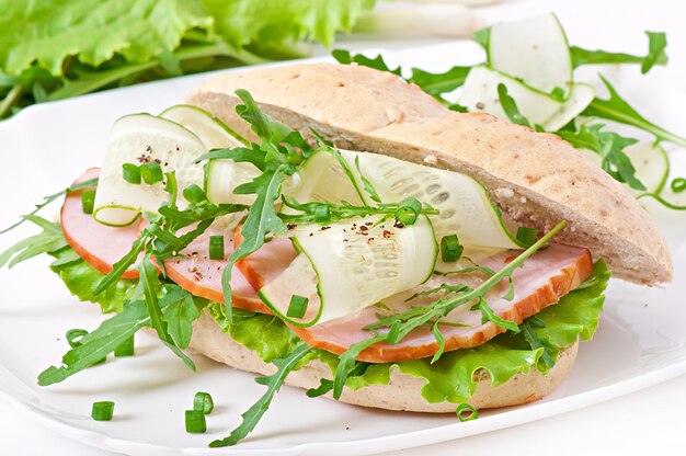Useful sandwich with ham and herbs