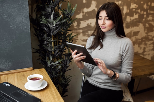 using woman computer internet laptop