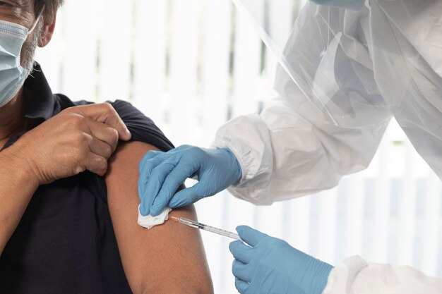 Vaccination center with doctor and patient