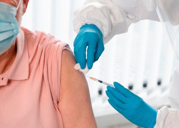 Vaccination center with doctor and patient