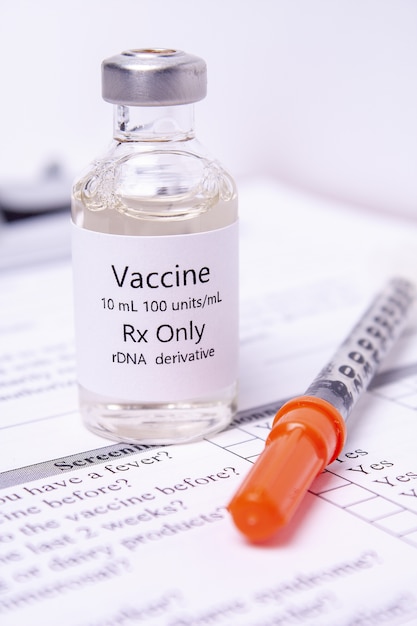 Vaccine and Syringe close up