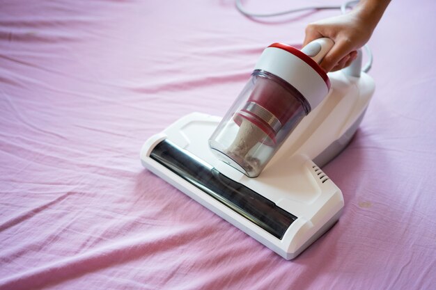 Premium Photo | Mite vacuum cleaner cleaning bed mattress dust eliminator