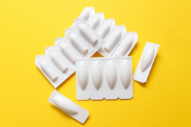 Vaginal suppositories for the treatment of female diseases. concept of female sexual health and disease prevention