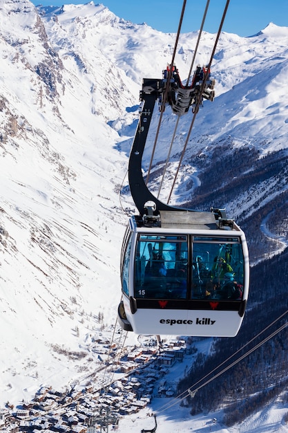 VAL D'ISERE, FRANCE - FEBRUARY 10, 2015: Famous cable way in Val d'Isere resort, part of the Espace killy ski area.