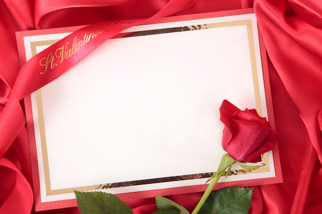 Free photo valentine card on red silk