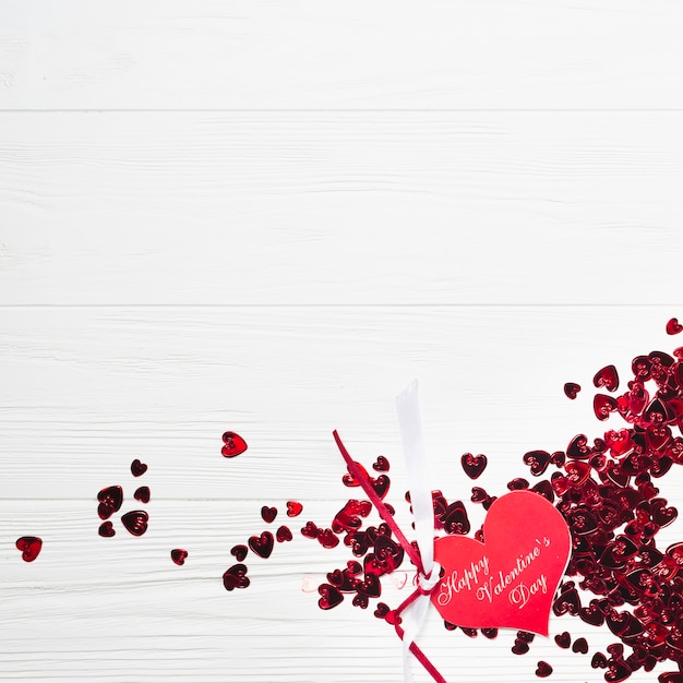 Free photo valentine's day card on confetti