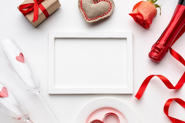 Valentine's day composition with empty white frame