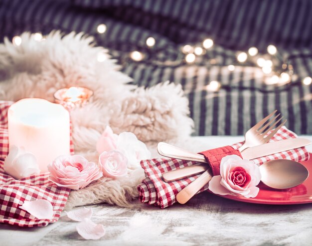 Valentine's Day festive dinner on a wooden table cutlery