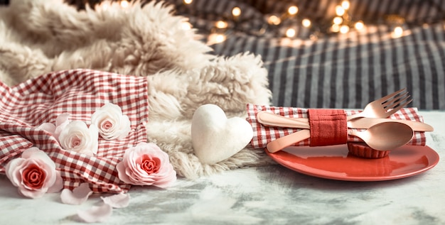 Valentine's Day festive dinner on a wooden table cutlery